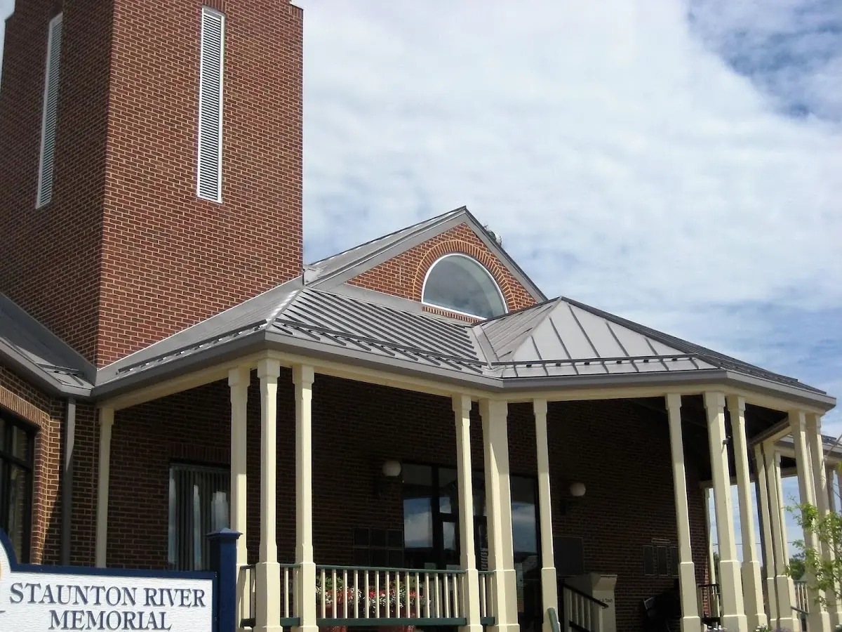 Skilled roofing craftsmen working on a residential roof in Point Pleasant